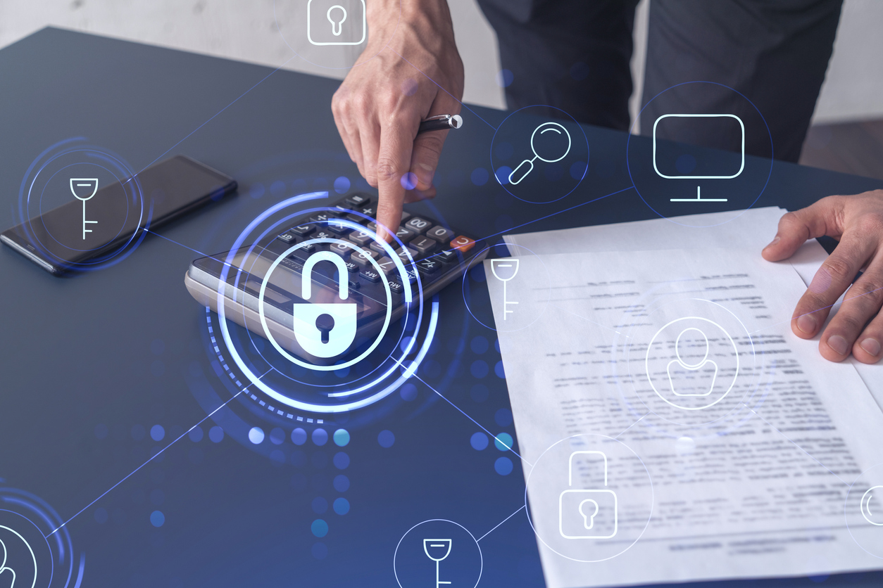 padlock-hologram-icon-over-a-working-desk-cybersecurity-audit-concept