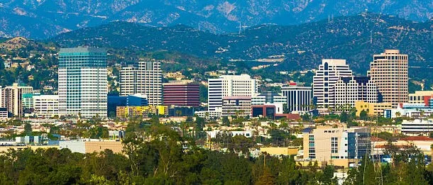 The Glendale, CA skyline with the San Gabriel Mountains behind it