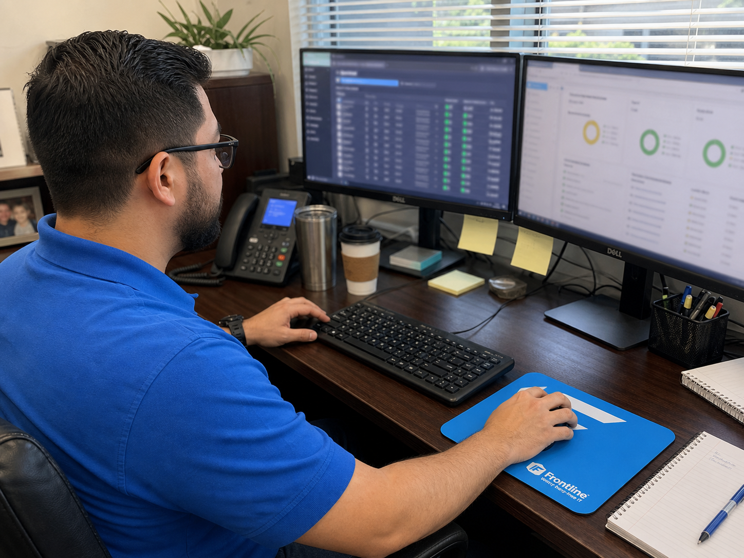 Frontline support engineers at their monitors answering client calls